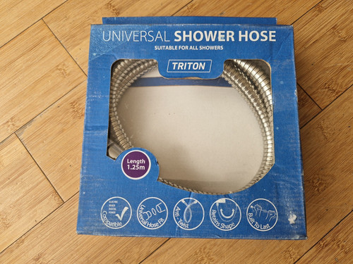 Triton crome shower hose new - shower,